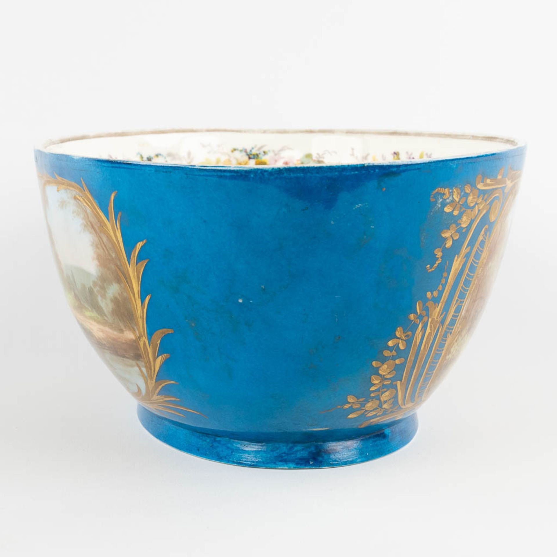 A large bowl, blue glaze with hand-painted decor, probably Limoges. (L:24 x W:39 x H:14 cm) - Image 4 of 12