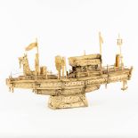 An antique Chinese model of a ship, sculptured bone. Circa 1900. (L:13 x W:50 x H:28 cm)