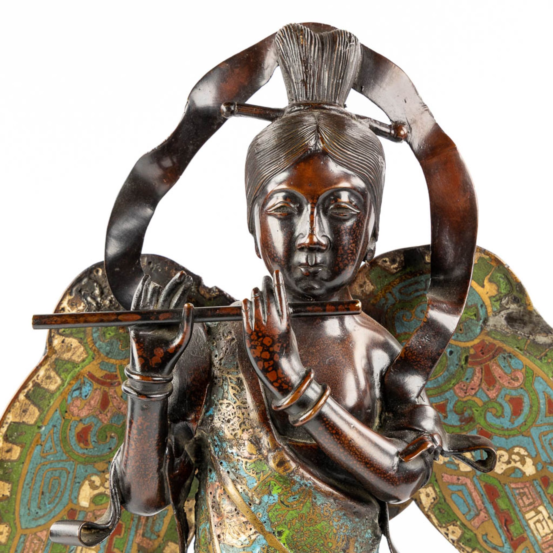 An Oriental figurine of an Angel with a flute, Champslevé bronze. (L:15 x W:35 x H:53 cm) - Image 9 of 14