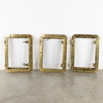 Three rectangular portholes, bronze. (L:17 x W:53 x H:74 cm)