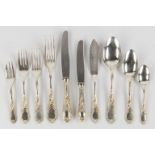 A 12-person, 135-piece silver-plated cutlery in Louis XV style. (L:30 cm)