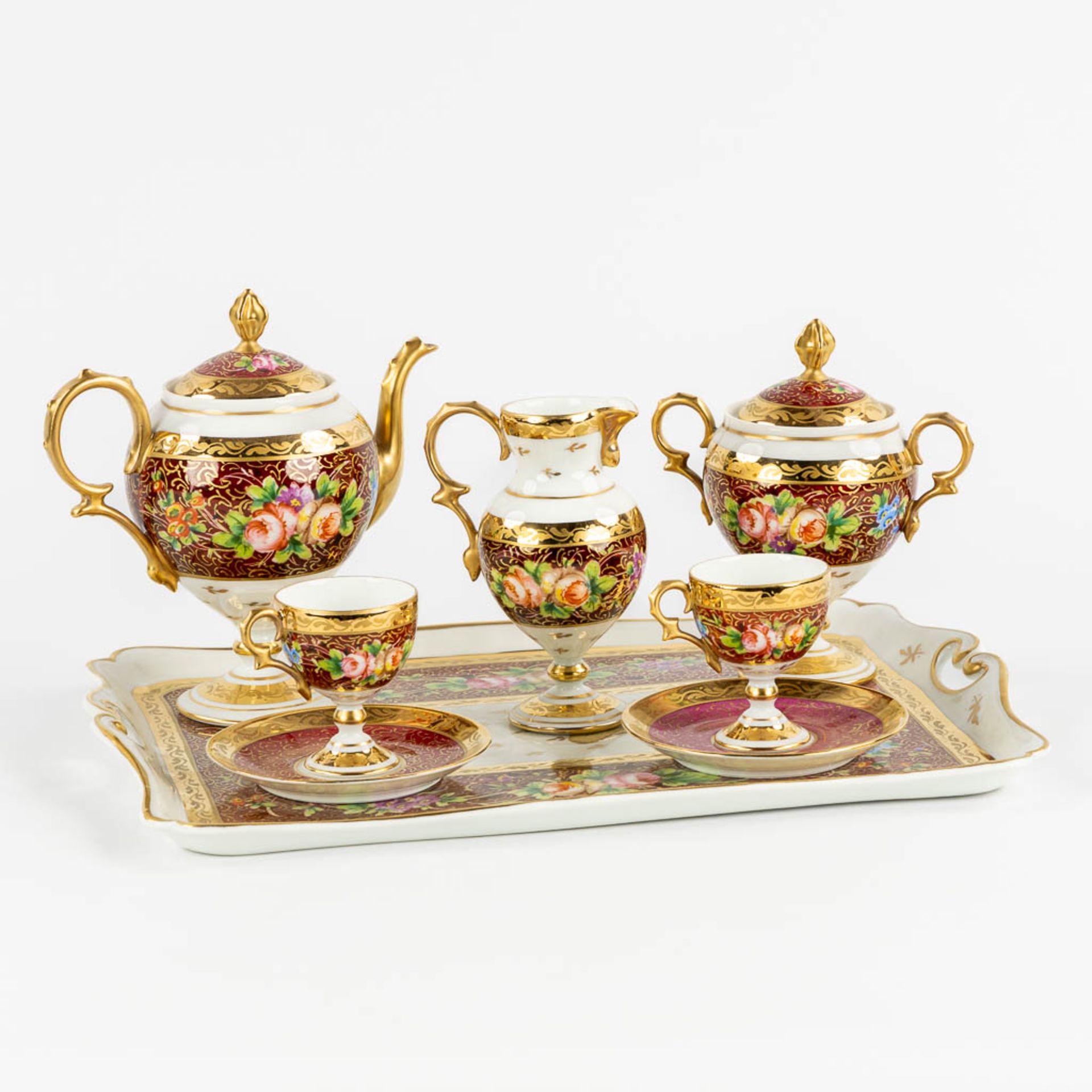 Giraud Limoges, a porcelain 'Tête à tête' coffee service. 20th C. (H:18 cm)