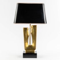 A vintage table lamp, with a patinated bronze figurine. 20th C. (L:25 x W:40 x H:66 cm)