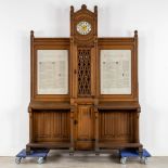 A Gotic Revival prayer bench and standing clock, Finished with Canon Boards, Oak, Circa 1900. (H:258