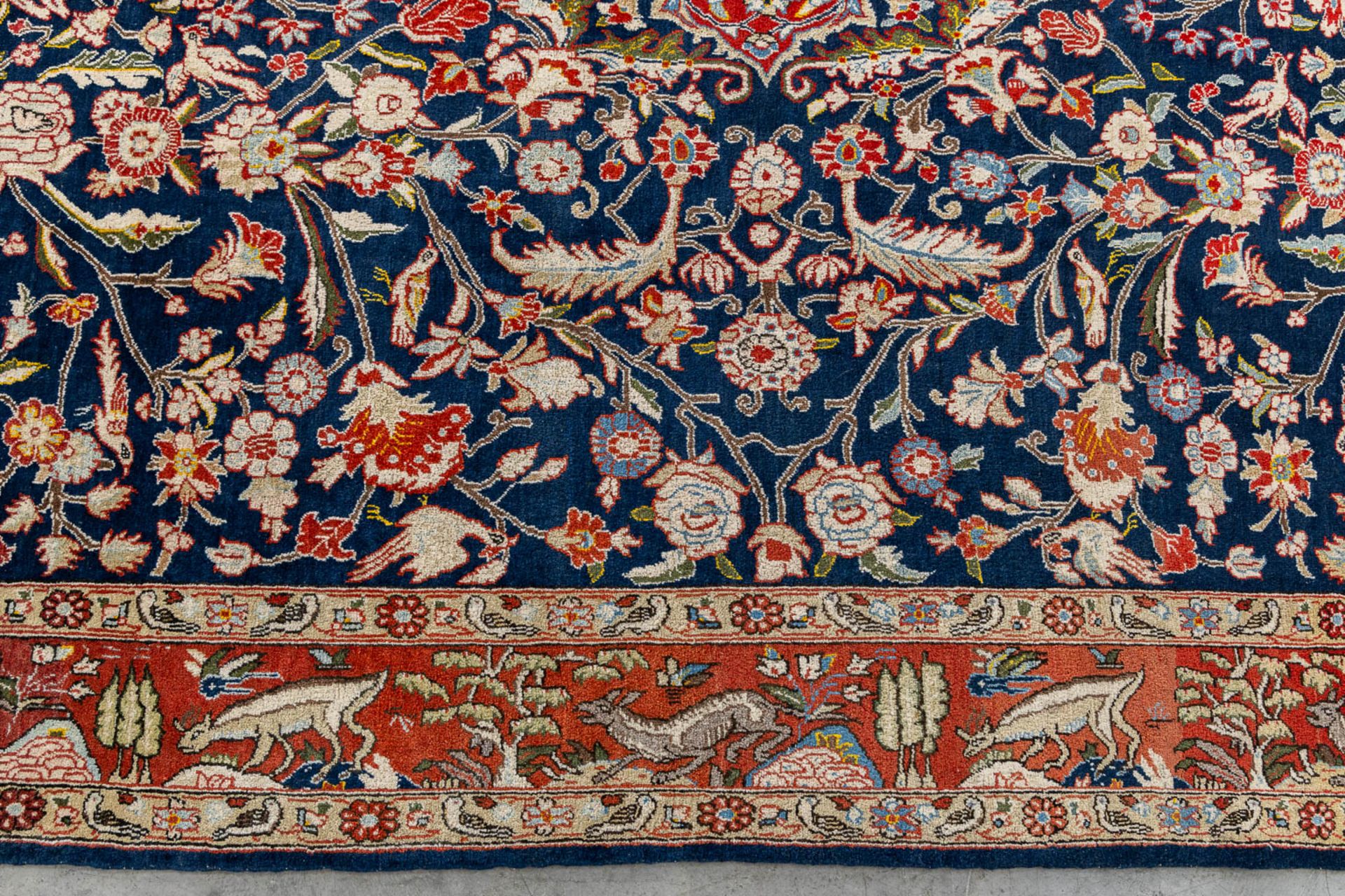 An Oriental, hand made carpet decorated with &quot;Fauna and Flora&quot;. (L: 320 x W: 223 cm) - Image 6 of 9