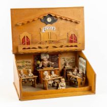 An antique lectern with a miniature diorama of a school, Probably Germany, First half of the 20th C.