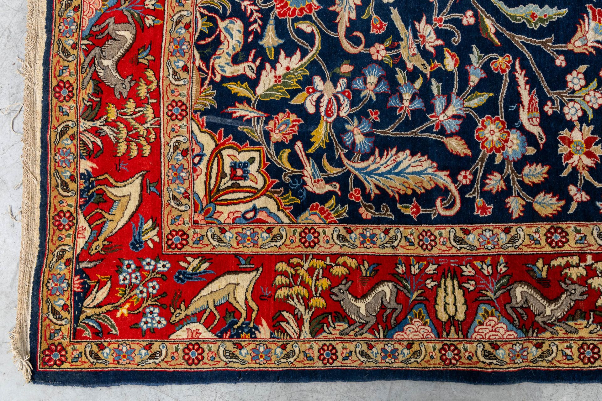 An Oriental, hand made carpet decorated with &quot;Fauna and Flora&quot;. (L: 320 x W: 223 cm) - Image 4 of 9