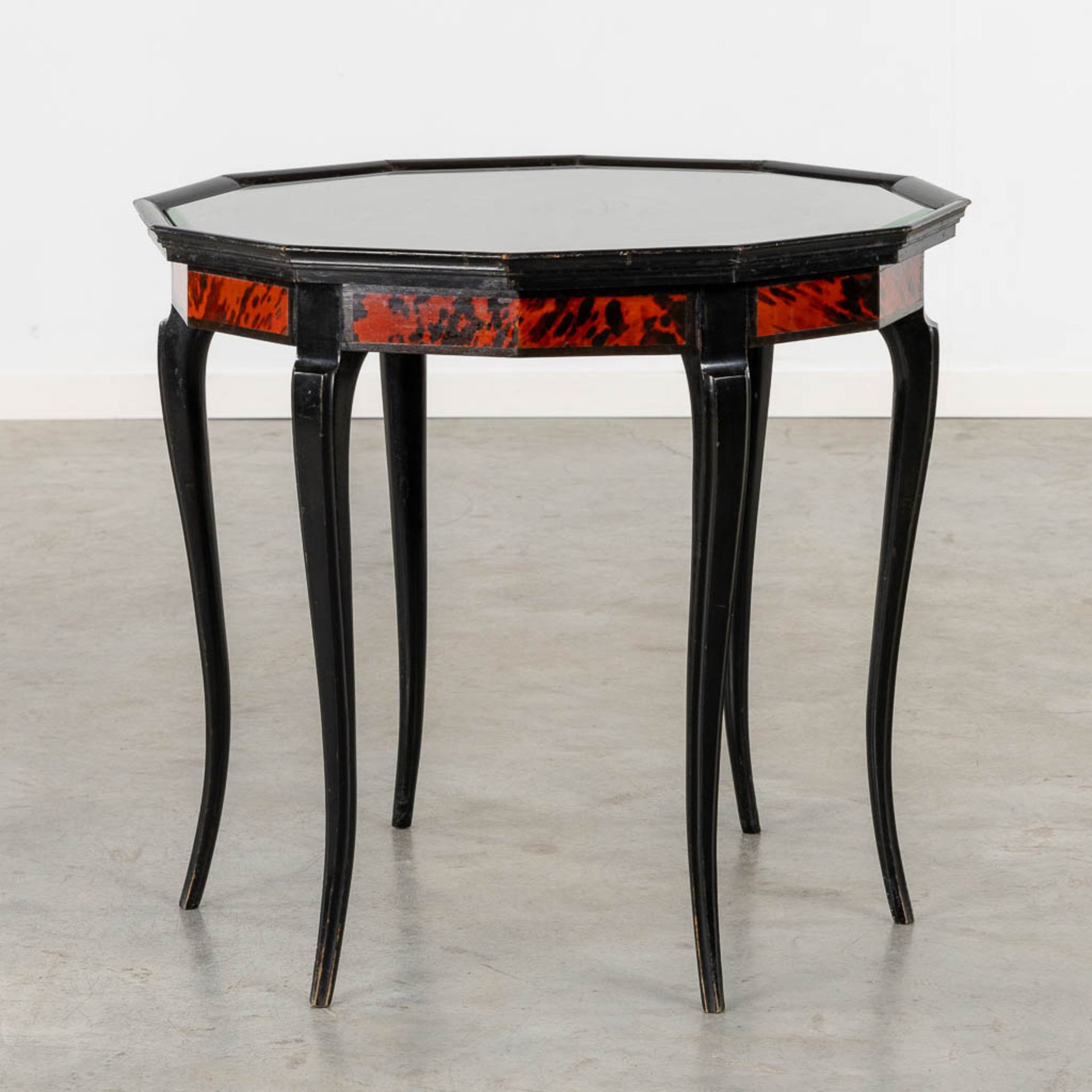 Maison Franck, Antwerp, an octagonal side table, tortoise shell and ebonised wood. (H:65 x D:72 cm) - Image 5 of 8