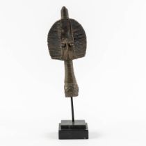 Kota Mahongwe, Gabon, a 'Reliquary Figure' copper on wood. (W:12 x H:27 cm)