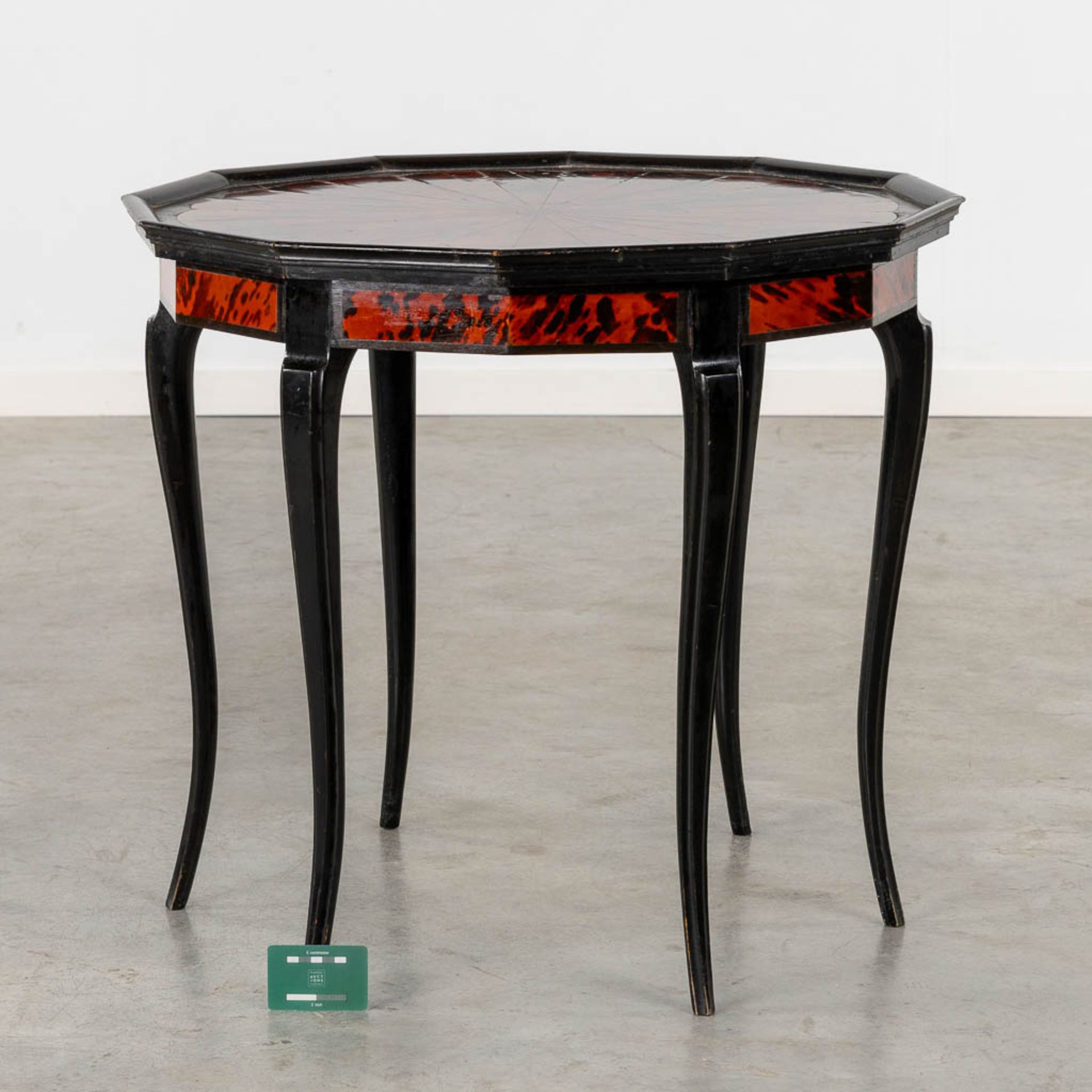 Maison Franck, Antwerp, an octagonal side table, tortoise shell and ebonised wood. (H:65 x D:72 cm) - Image 2 of 8