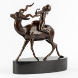 Cupid riding an Antelope, patinated bronze on a black marble base. (L:16 x W:40 x H:40 cm)