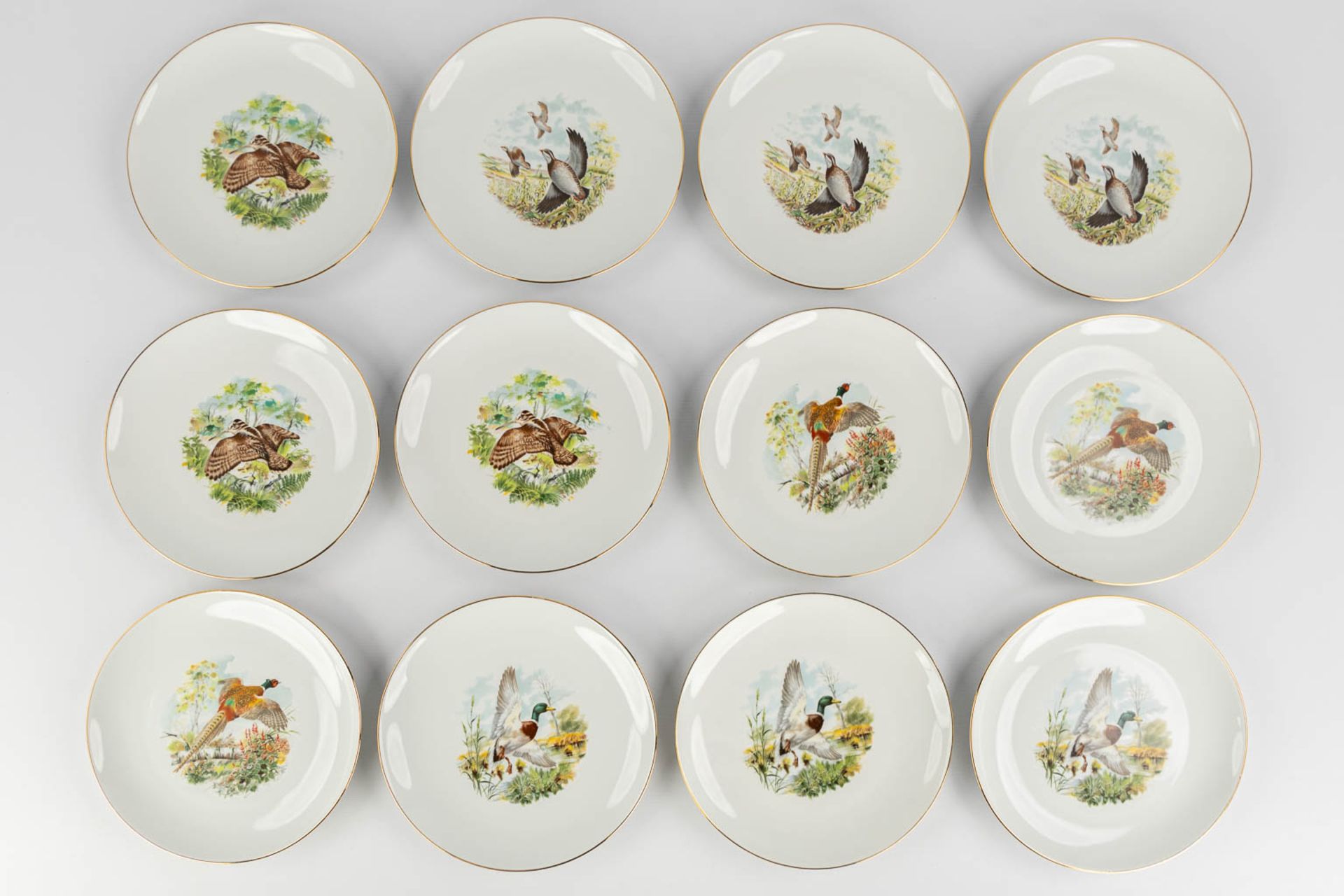 Limoges, France, a large, 12-person dinner, wild and coffee service. (L:23 x W:34 x H:22 cm) - Image 23 of 28