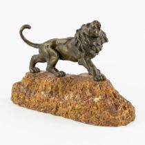 A. TREFOLONI (XIX-XX) 'Lion' patinated bronze. (L:14 x W:33 x H:23 cm)