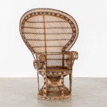 A large rotan 'Emmanuelle Chair' or Peacock chair. (L:57 x W:110 x H:145 cm)