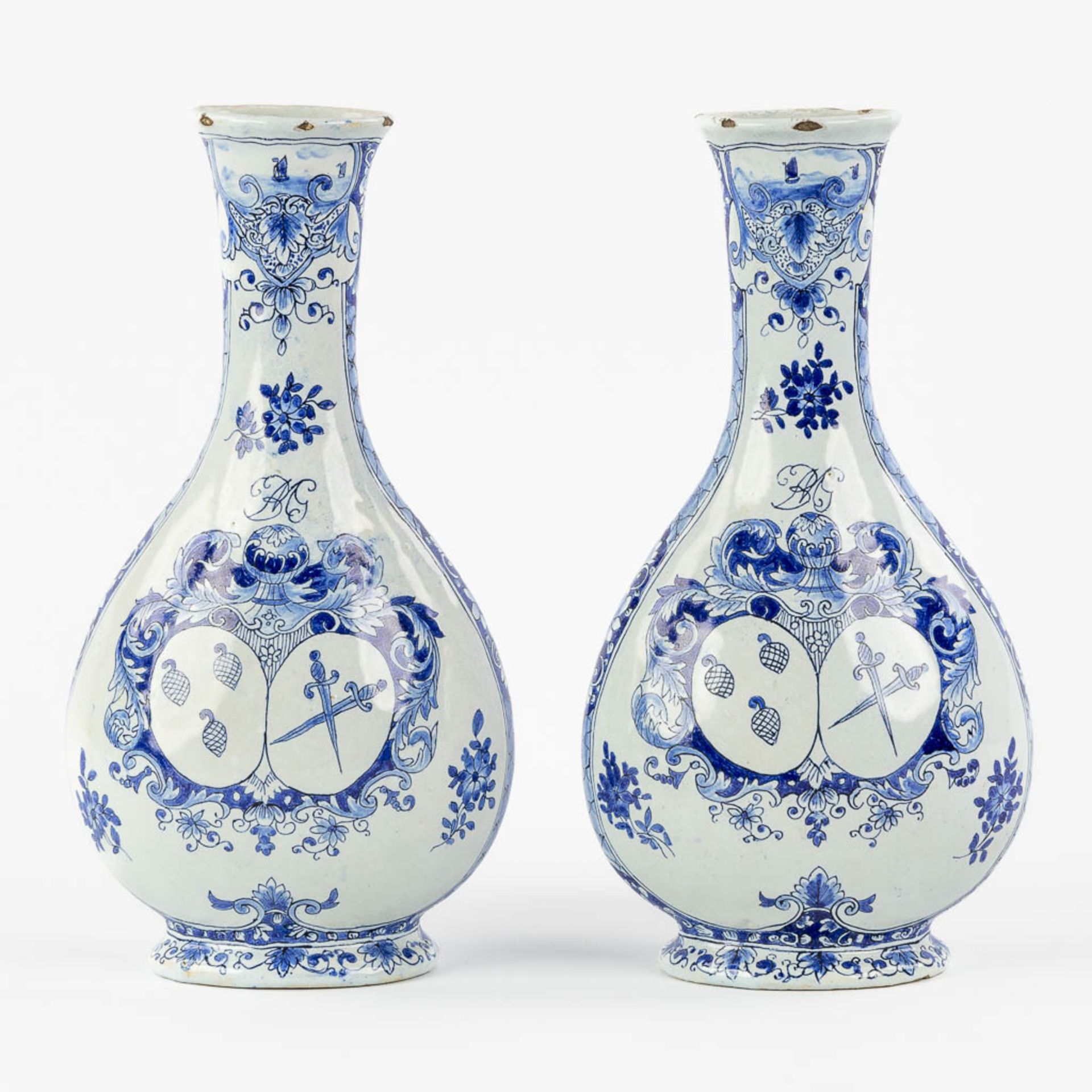 Geertrui Verstelle, Delft, a pair of vases with a landscape decor. Mid 18th C. (L:9 x W:14 x H:26,5 - Image 5 of 15