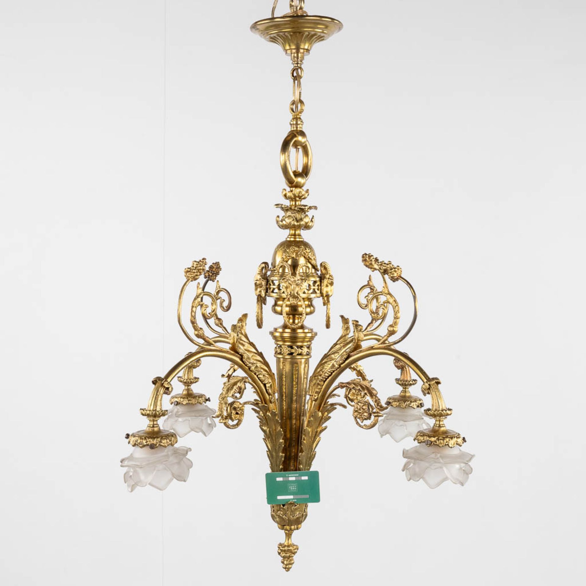 A chandelier, bronze finished with ram's heads, Louis XVI style. (H:93 x D:66 cm) - Image 2 of 13