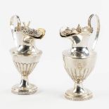 A pair of silver water and wine cruets. Europe, 18th/19th C. (L:5,3 x W:8,5 x H:12 cm)