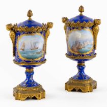 Sèvres, a pair of kobalt blue vases with a lid, decorated with a seascape. 19th C. (L:8 x W:11 x H:2