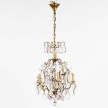 An antique chandelier, brass with coloured and white glass. (H:73 x D:47 cm)