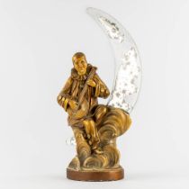 Pierrot Lunaire, a gilt plaster figurine with a mirror. Circa 1920. (L:17 x W:30 x H:64 cm)