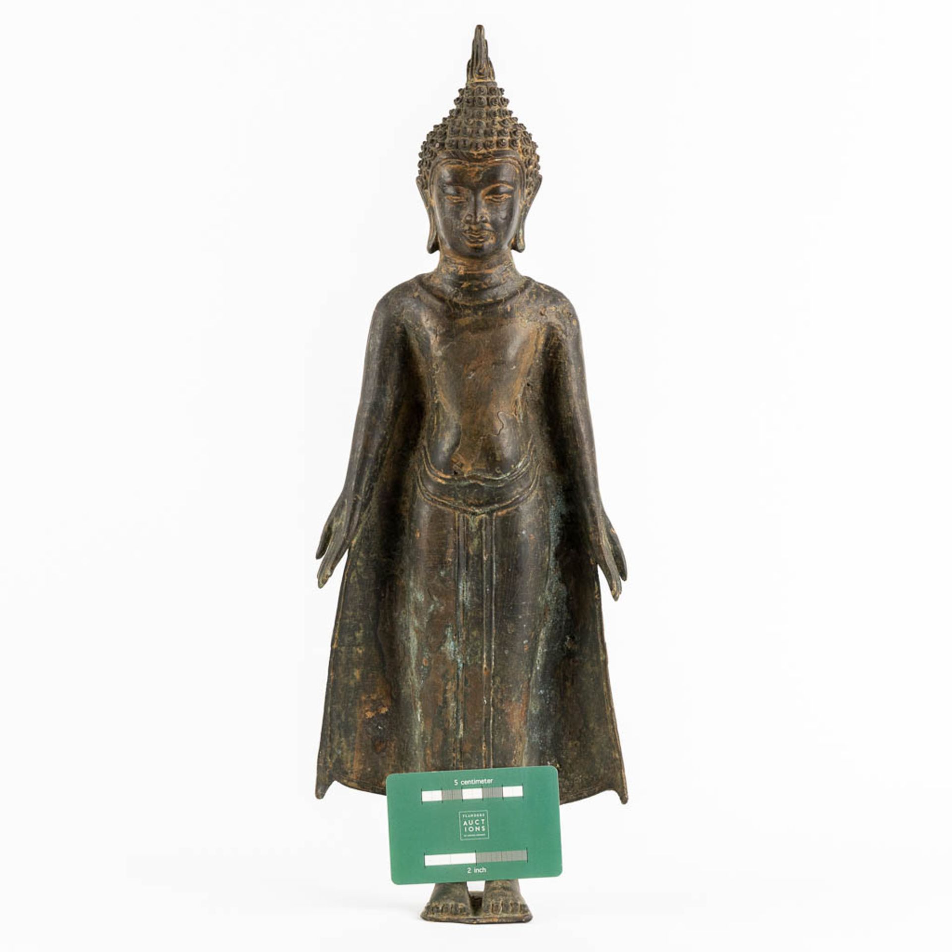 A Thai figurine of a standing Buddha, Patinated bronze. (W:16 x H:44 cm) - Image 2 of 10
