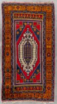 An Oriental hand-made carpet, probably Turkey, Anatolia. (L:236 x W:132 cm)