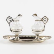 A pair of water and wine cruets, silver and cut glass. Gothic Revival style, France. 19th C. (L:14 x