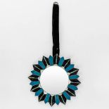 A mid-century Sunburst mirror, blue and black enamel on copper, glass. (D:31,5 cm)