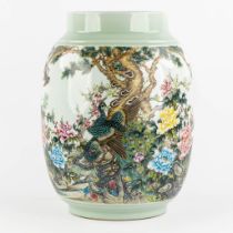 A large Chinese vase with a decor of fauna and flora. (H:48 x D:35 cm)