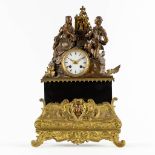 An antique mantle clock 'The Prayer', patinated and gilt bronze, black marble. 19th C. (L:12 x W:33
