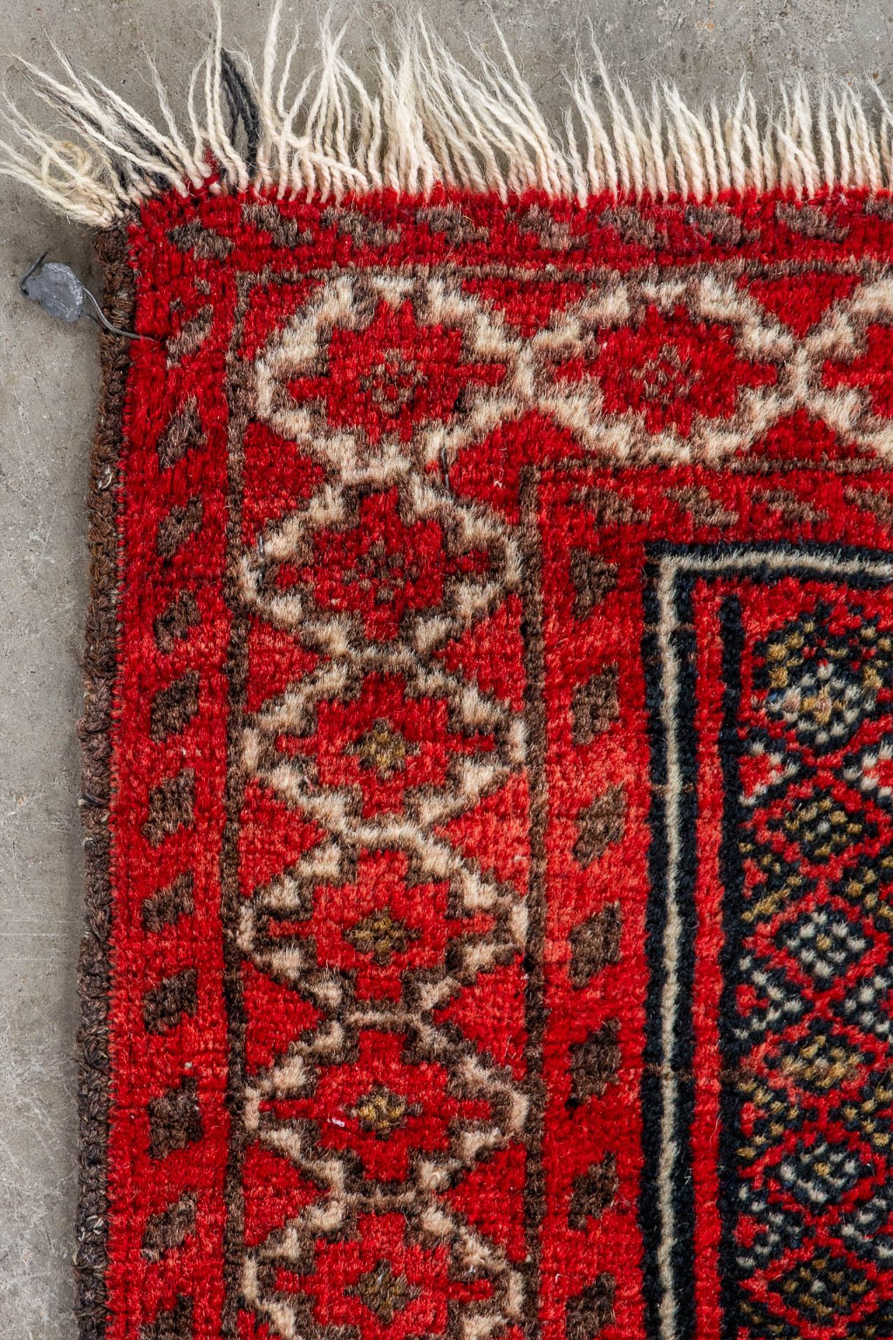 An Oriental hand-made carpet, Bellutch, Prayer rug. (L:130 x W:83 cm) - Image 7 of 8