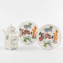 A Chinese pair of plates and a teapot. Decorated with Foo Lions and Figurines. (H:18 cm)