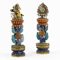 Two Chinese enamel inlaid and gilt metal Buddhist altar ornaments. 19th C. (H:32 x D:9 cm)