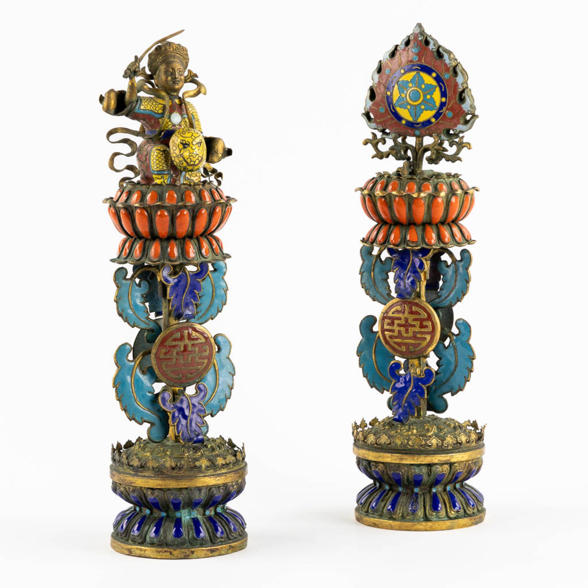 Two Chinese enamel inlaid and gilt metal Buddhist altar ornaments. 19th C. (H:32 x D:9 cm)
