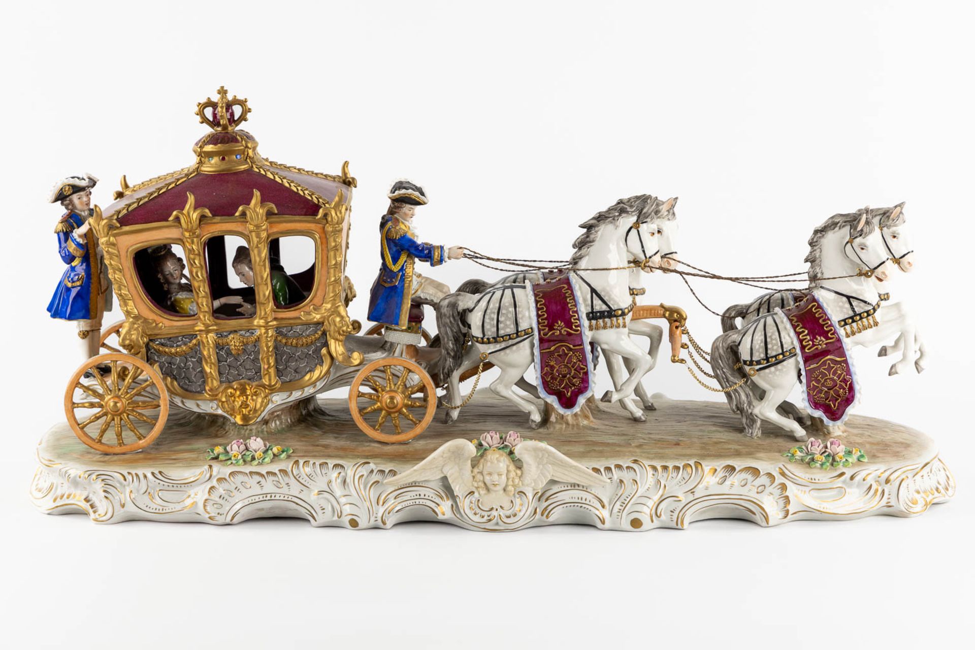 Sitzendorf, a large horse-drawn carriage, polychrome porcelain. (L:28 x W:74 x H:33 cm)