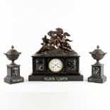 A three-piece mantle garniture clock and side pieces, patinated bronze on black marble. 19th C. (L:2