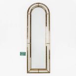 Deknudt, an elongated mirror, brass and glass. (W:35 x H:106 cm)