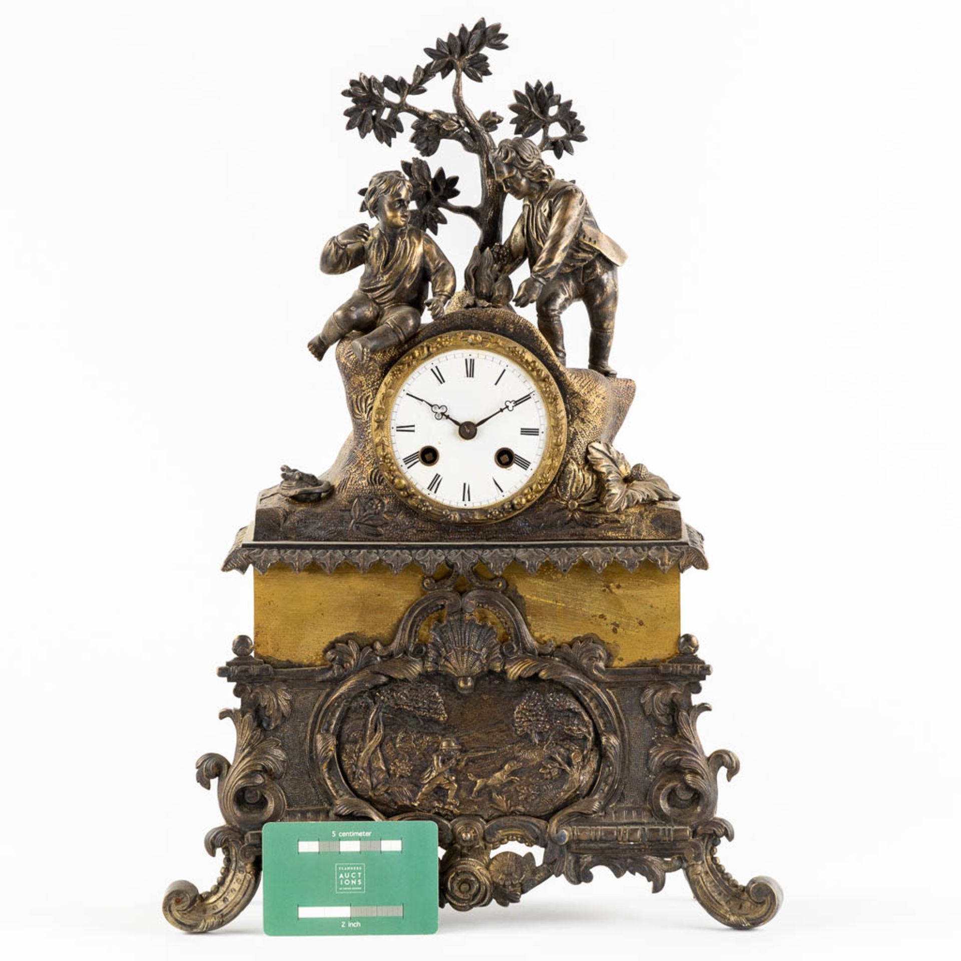 A mantle clock, patinated and gilt bronze with a hunting and camping scène. 19th C. (L:10 x W:30 x H - Bild 2 aus 11