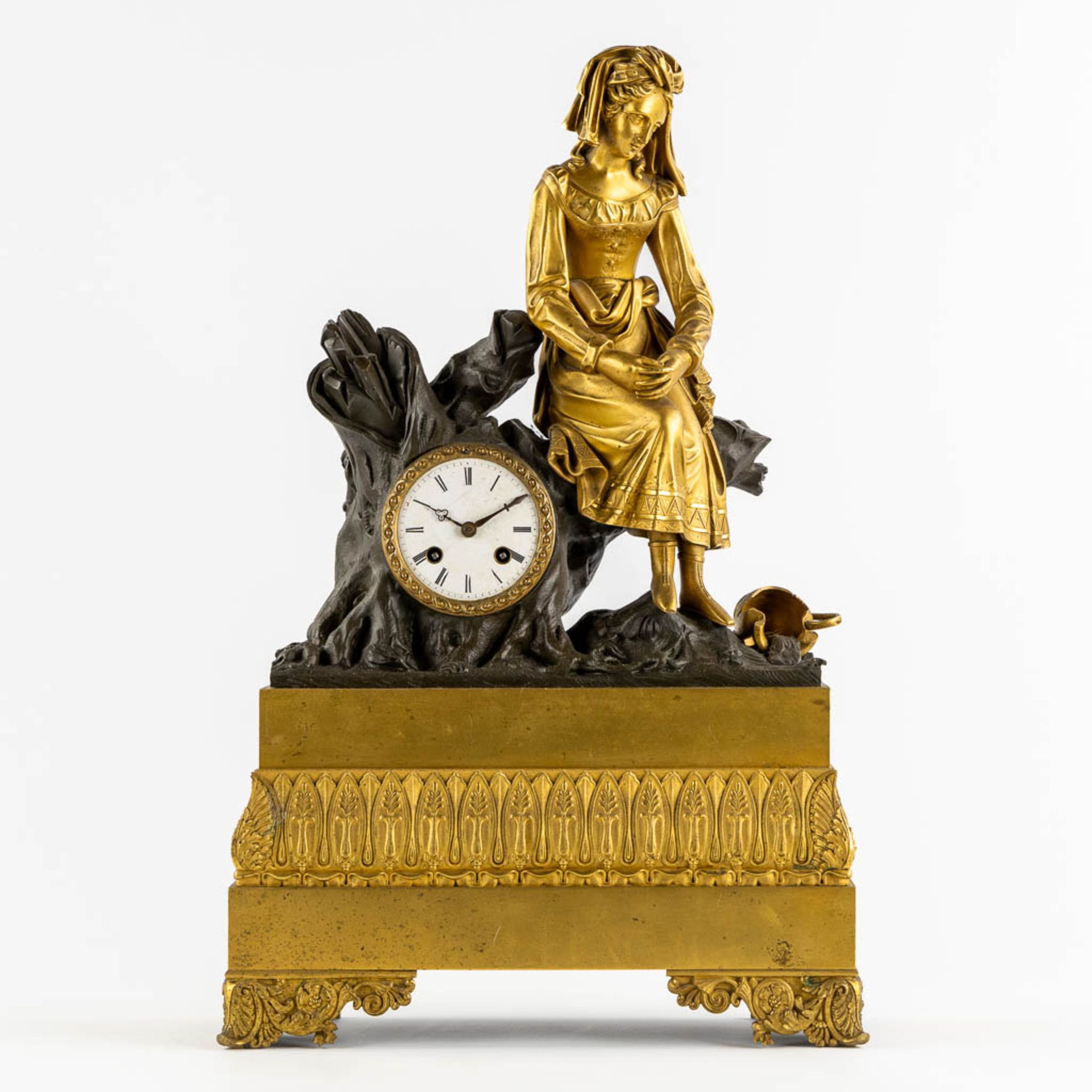 A mantle clock, gilt and patinated bronze 'La Cruche Cassée' or 'The Broken Jar'. Empire Style. 19th