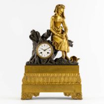 A mantle clock, gilt and patinated bronze 'La Cruche Cassée' or 'The Broken Jar'. Empire Style. 19th