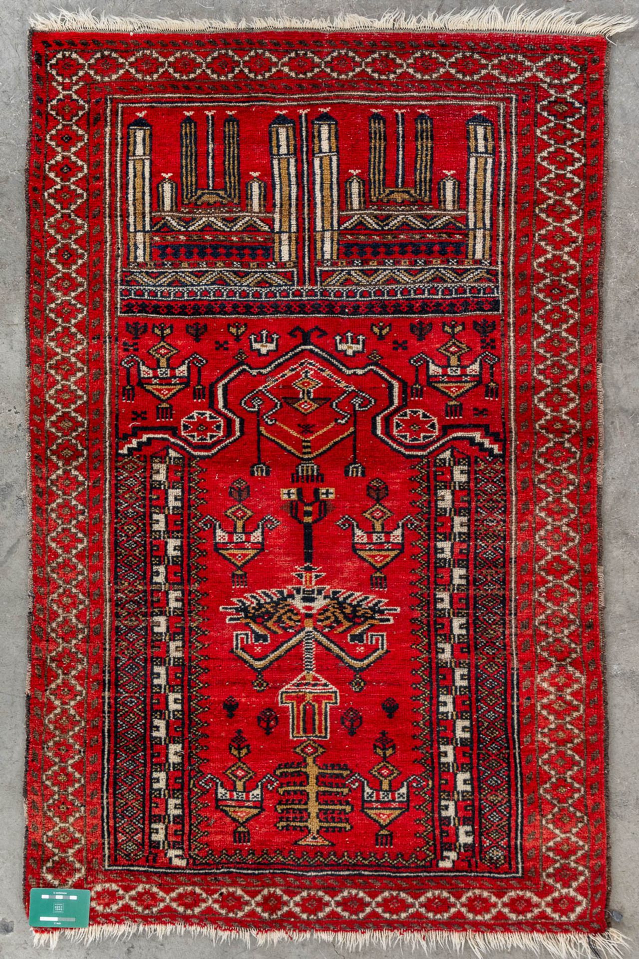 An Oriental hand-made carpet, Bellutch, Prayer rug. (L:130 x W:83 cm) - Image 2 of 8