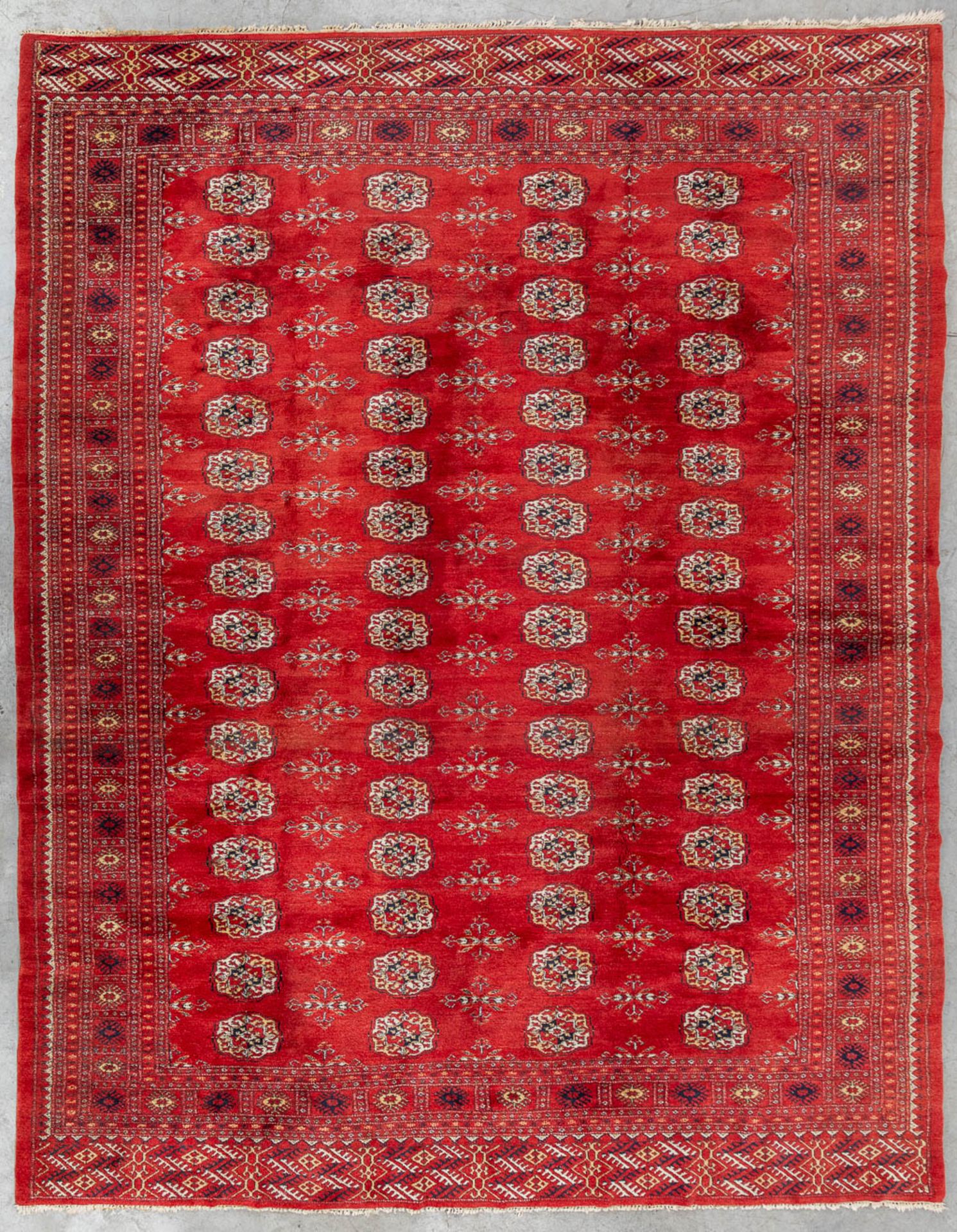 An Oriental hand-made carpet, Turkmenistan, Bucchara. (L:317 x W:252 cm)