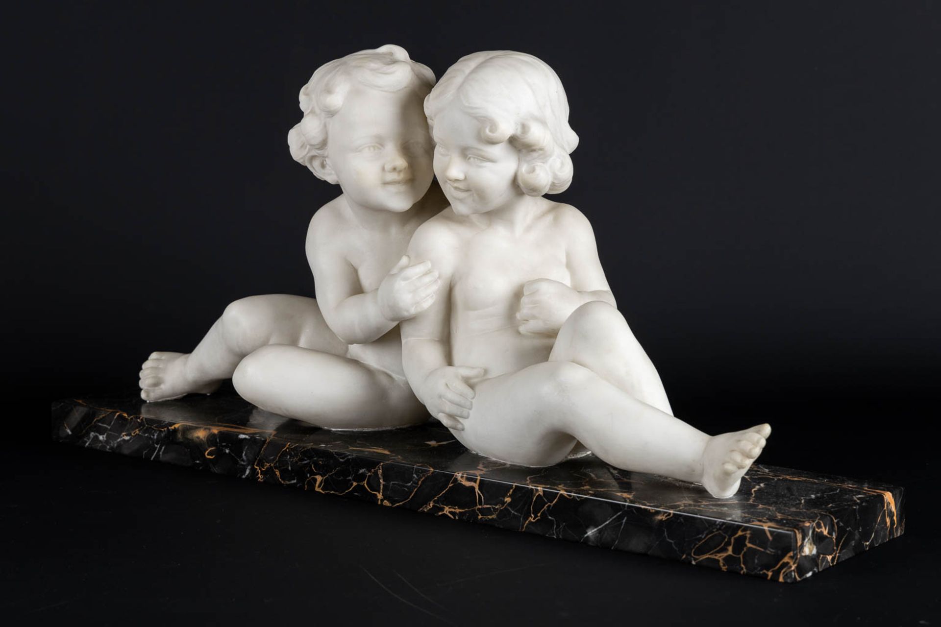 L. MORELLI (XX) 'Two Girls' sculptured Carrara marble. Italy, 1st half of the 20th C. (L:15 x W:65 x - Image 4 of 10