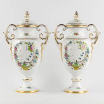 Herend, a pair of vases with a hand-painted flower decor. Polychrome porcelain. (L:20 x W:30 x H:50