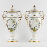 Herend, a pair of vases with a hand-painted flower decor. Polychrome porcelain. (L:20 x W:30 x H:50