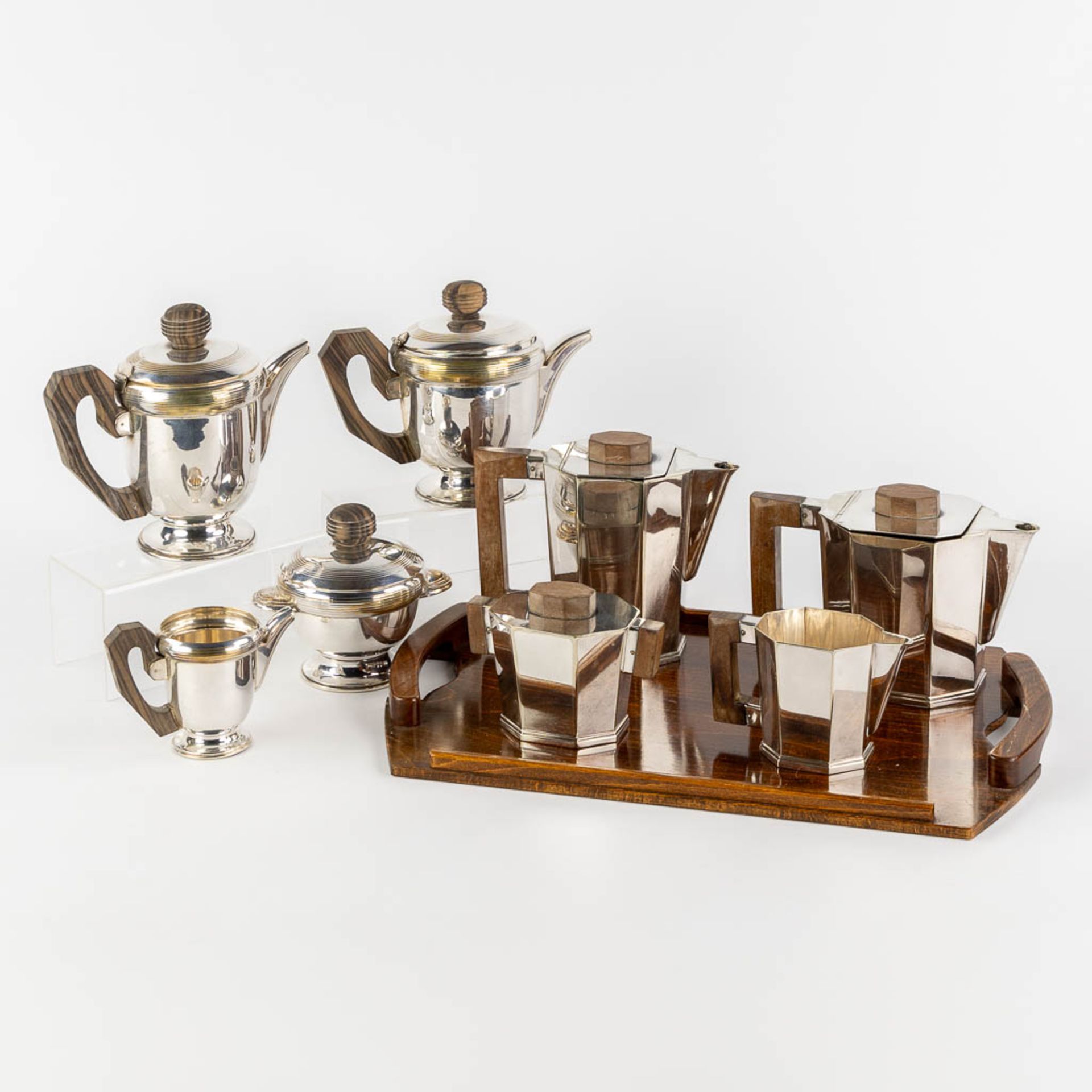 Two silver-plated coffee and tea services, Art Deco. (L:31 x W:49 cm)