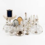A large collection of silver and glass items, picture frames, serving ware and table accessories. 19