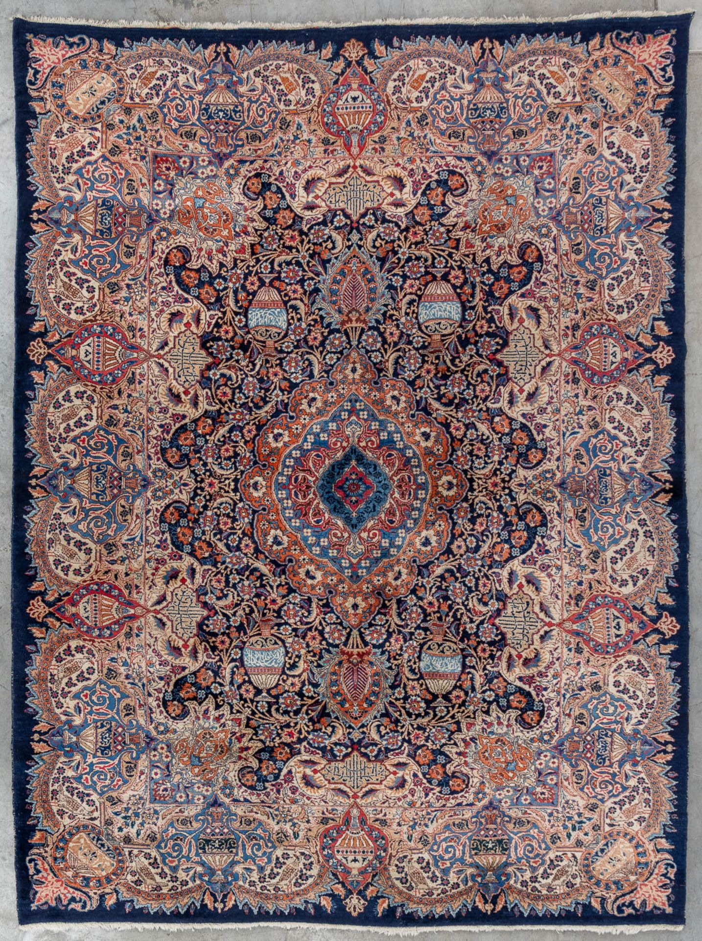 An Oriental hand-made carpet, Kashmar. (L:343 x W:256 cm)