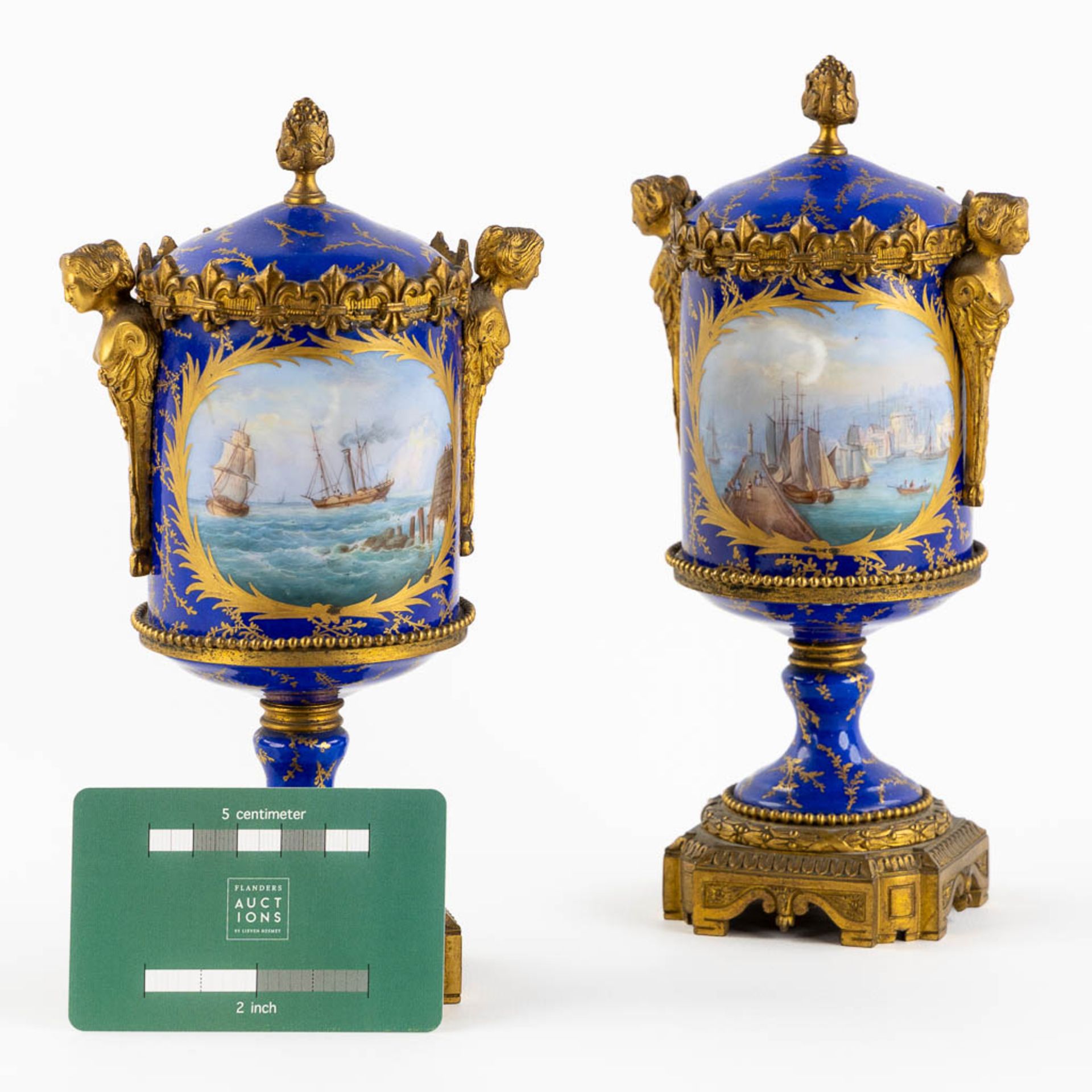 Sèvres, a pair of kobalt blue vases with a lid, decorated with a seascape. 19th C. (L:8 x W:11 x H:2 - Image 2 of 14