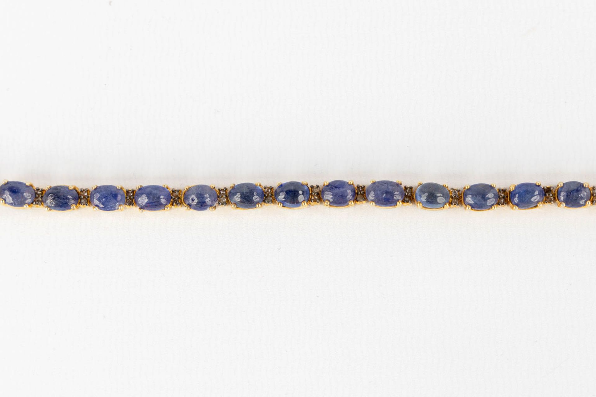 A bracelet, gilt silver with cabochon Sapphires and old cut diamonds. 23,35g. - Image 6 of 8